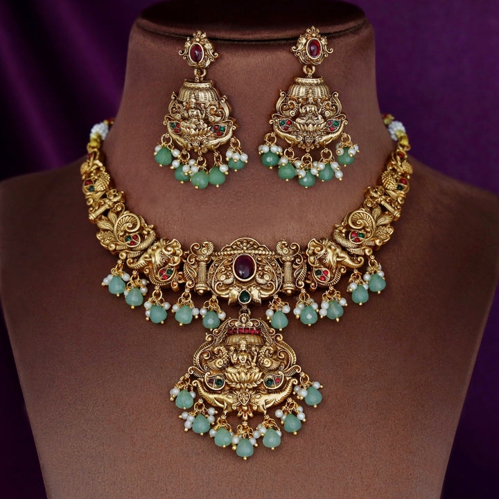 Pamadhya Lakshmi Pendant Neckpiece With Earring