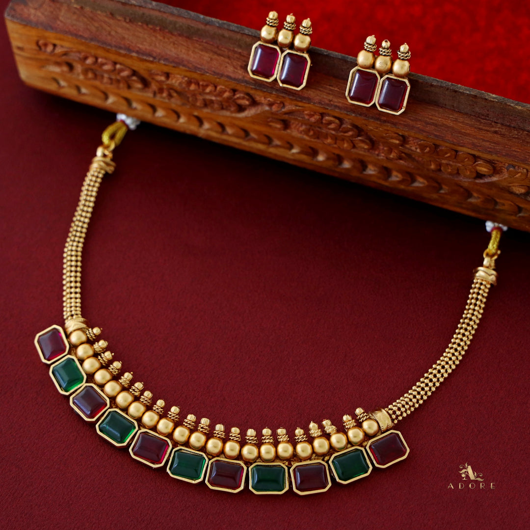 Likhitha Golden Glossy Stone Neckpiece With Earring