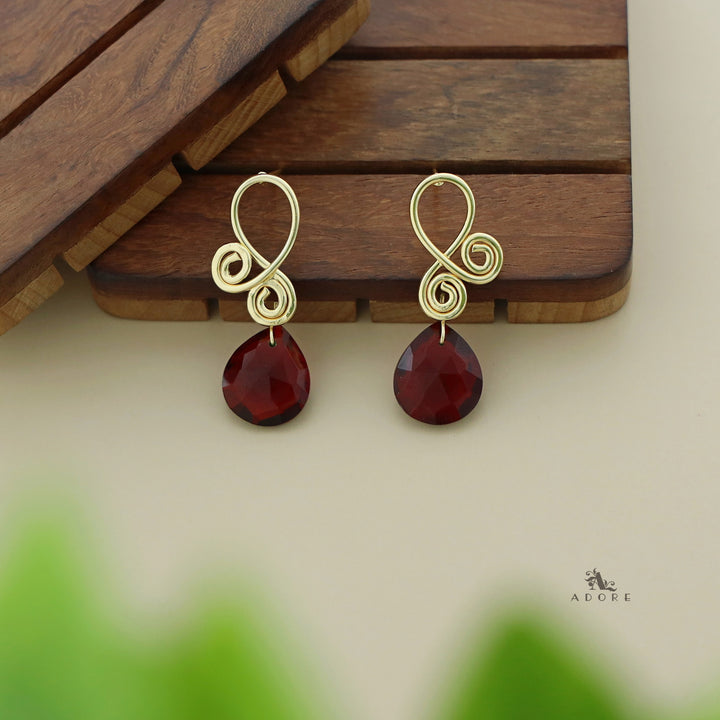 Aaira Golden Drop Glossy Earring