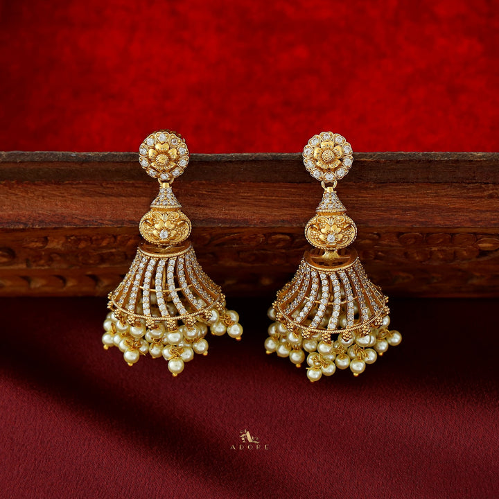 Dhanu Floral AD Stone + Pearl Jhumka